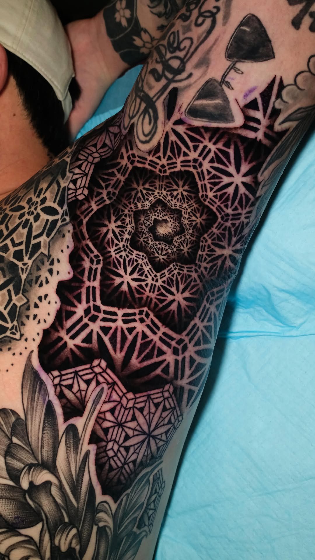 Geometric tattoo by Raúl Wesche