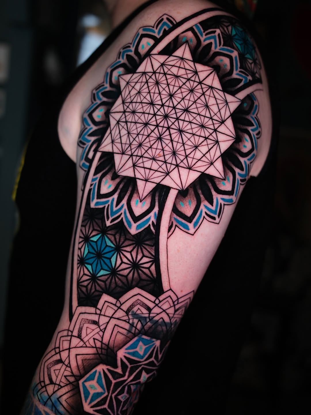 Geometric tattoo by Raúl Wesche