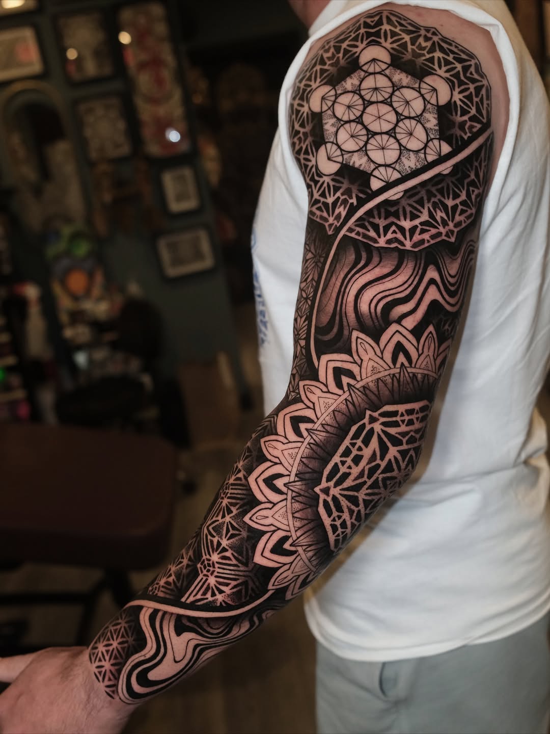 Geometric tattoo by Raúl Wesche