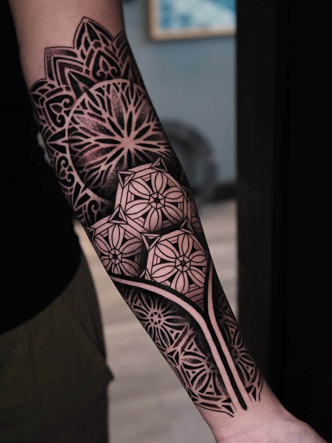 Geometric tattoo by Raúl Wesche