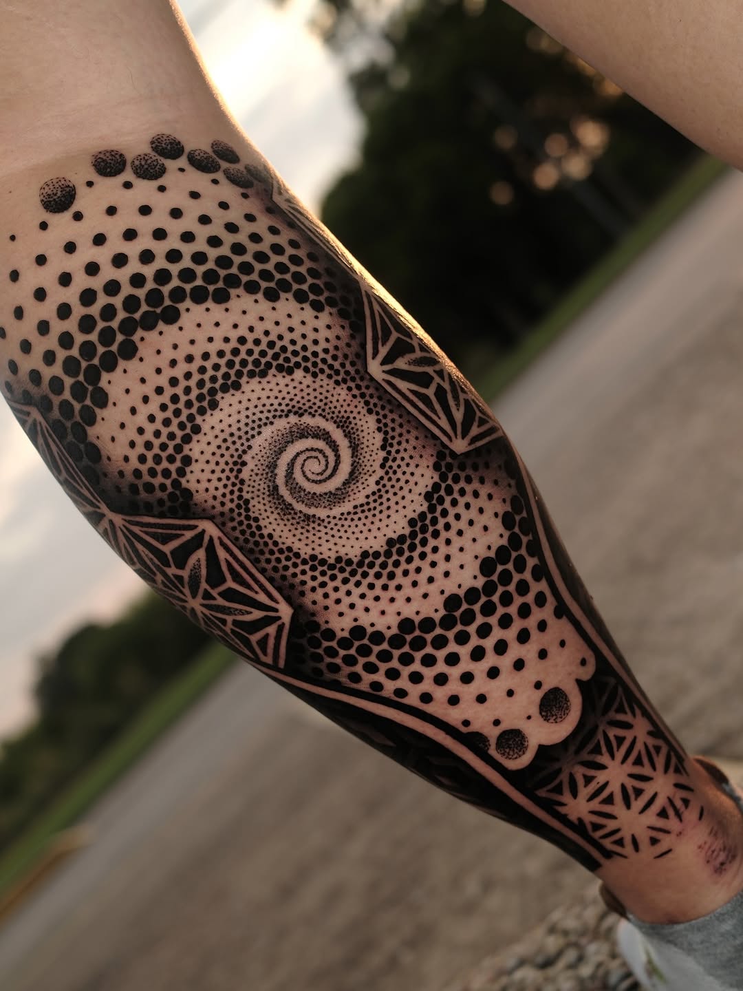 Geometric tattoo by Raúl Wesche